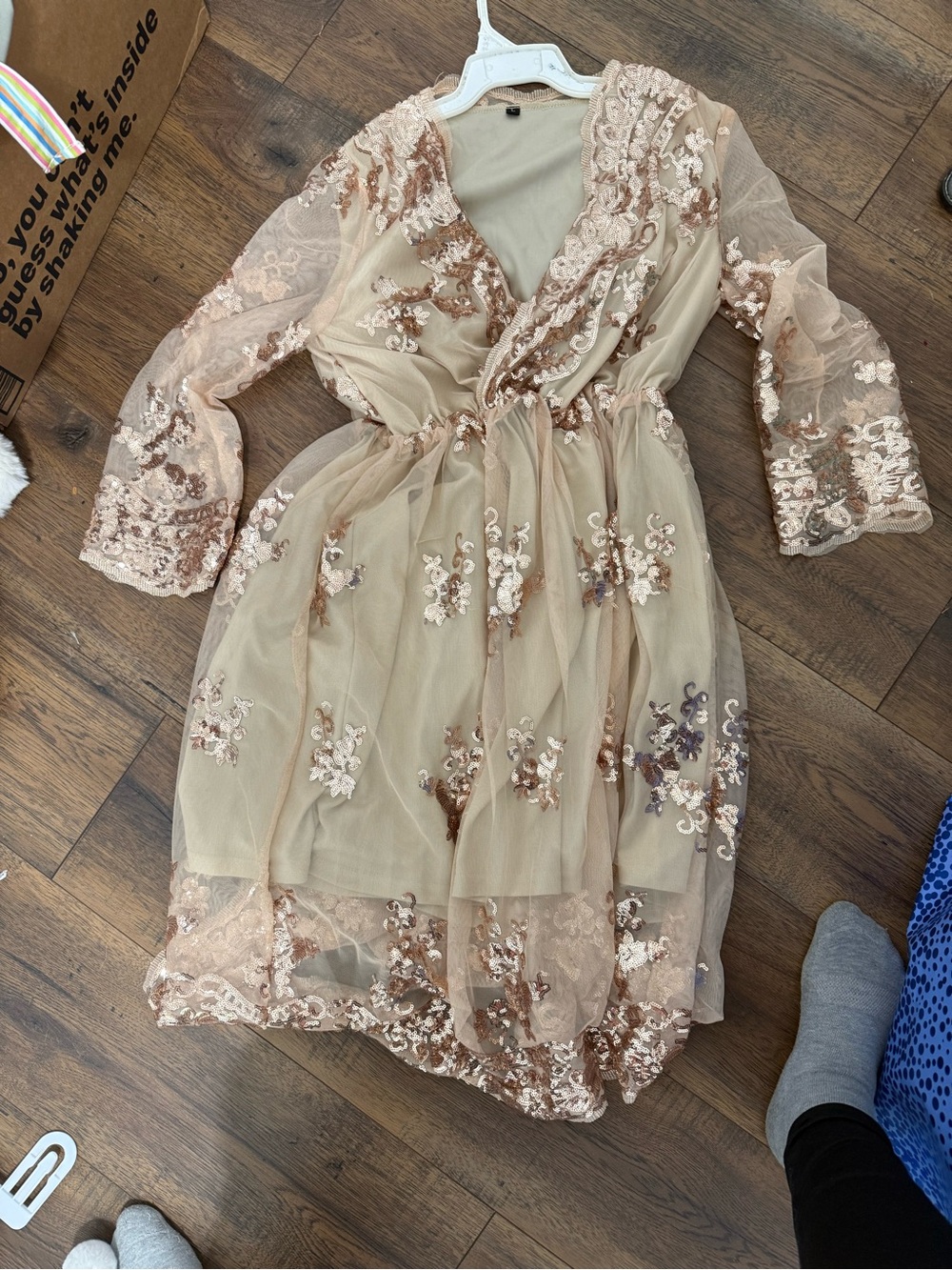 Women’s gold sequined dress